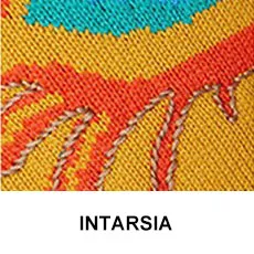 Detail einer mehrfarbigen Intarsia-Stricktechnik